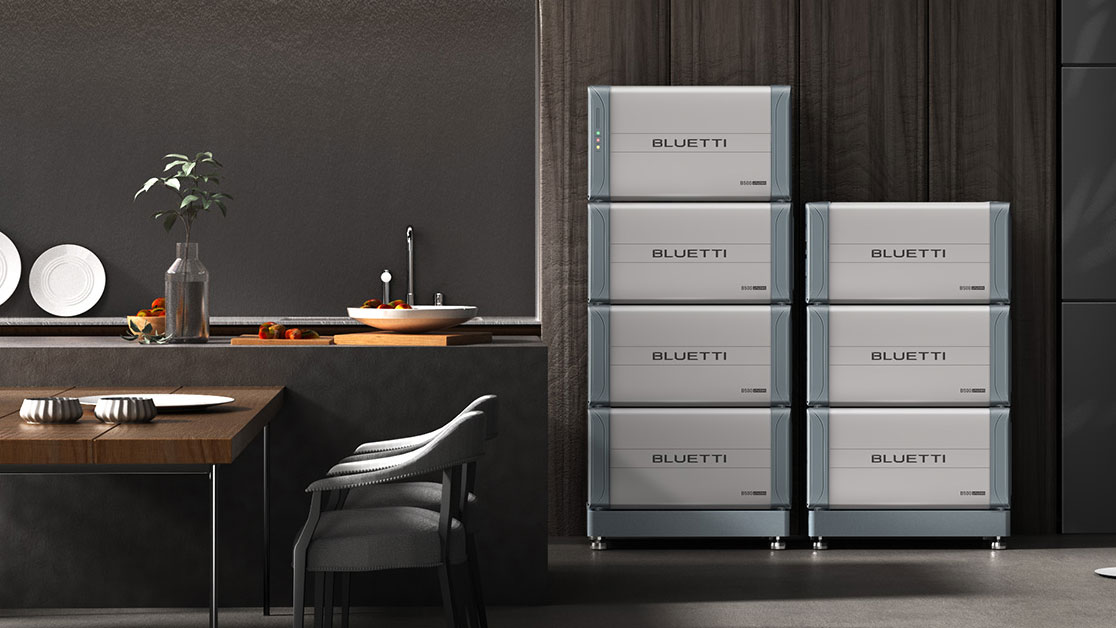 A stack of Bluetti B500 batteries sit in a smart designer dining room
