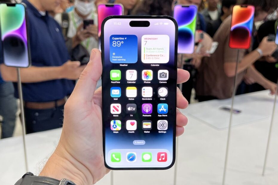 The iPhone 14 Pro Max being held in a hand