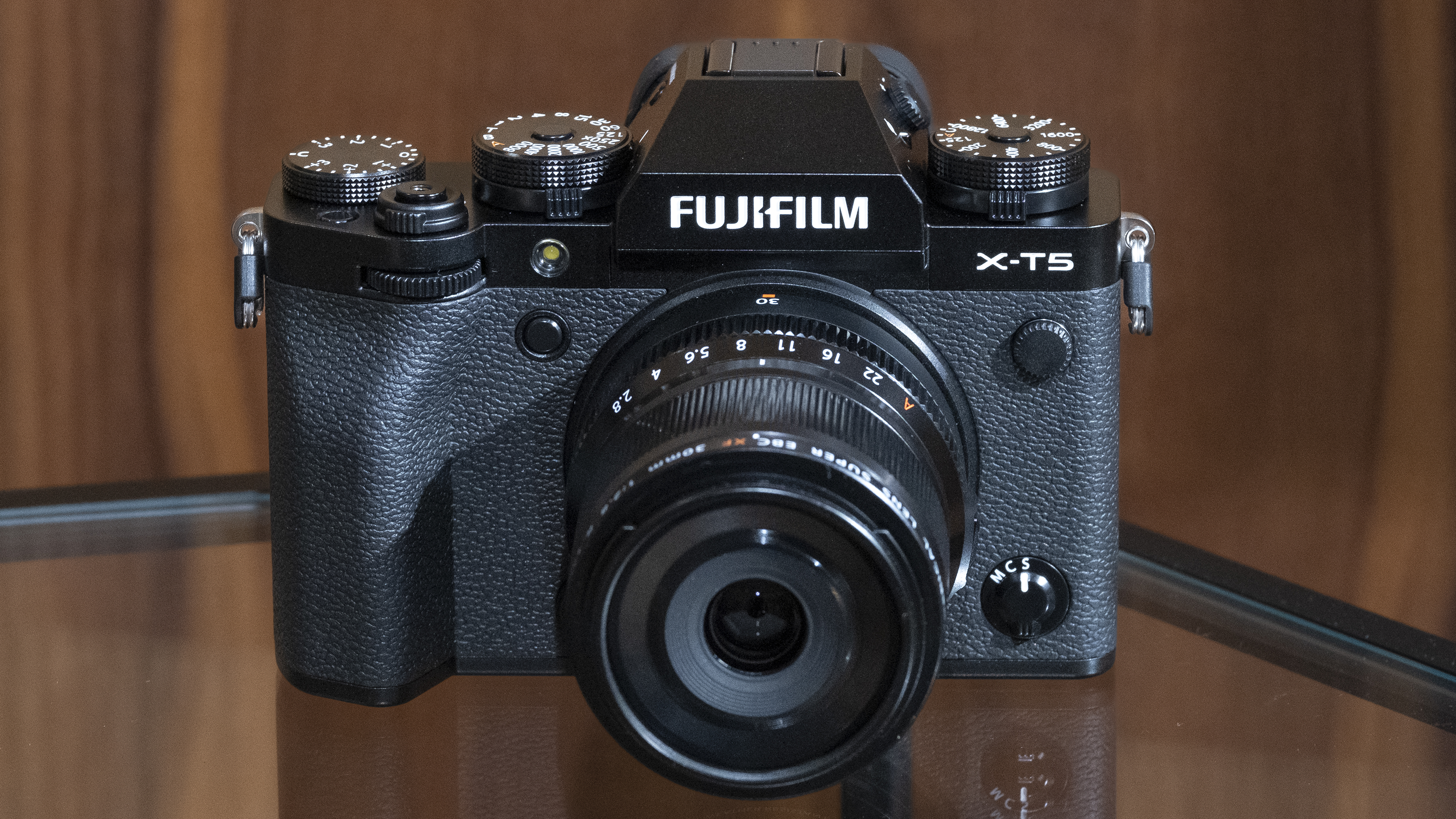 The Fujifilm X-T5 camera sitting on a table