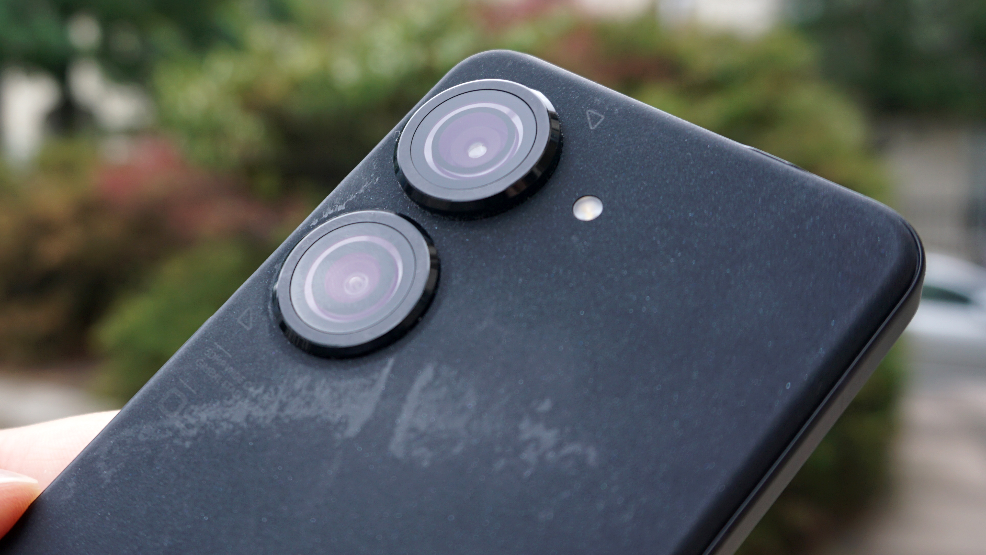 A close up of the camera block on an Asus Zenfone 9