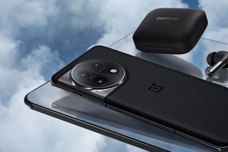 A OnePlus 11 and tablet and earbuds floating in front of clouds